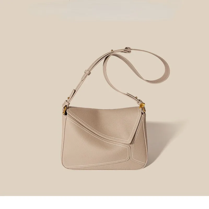 Дамска чанта Геометрична чанта от естествена кожа 2023 Есенна дамска чанта за рамо под мишниците Женска популярна чанта за пътуване . ' - ' . 0